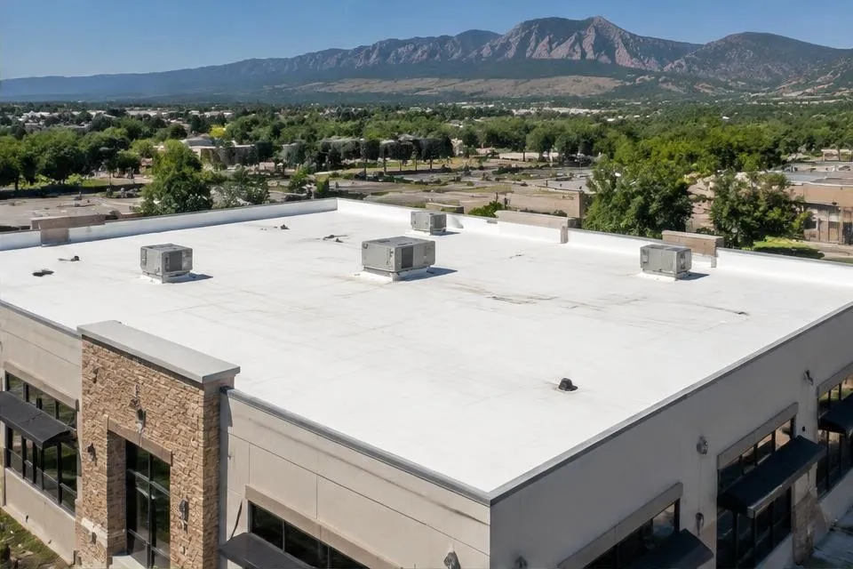 White membrane roof on a Colorado commercial building