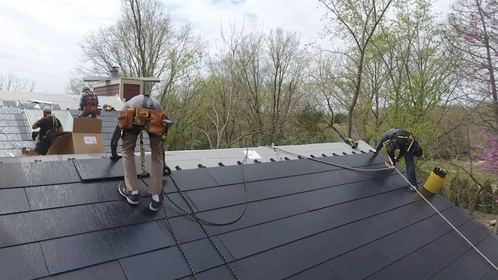 Weddle and Sons crew installing a solar roof on an Erie, Colorado area home