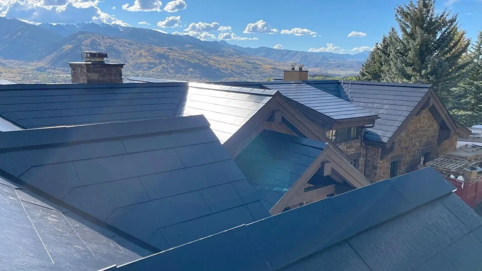 Solar roof tiles on a Colorado home near Fort Collins with mountain and valley views beyond