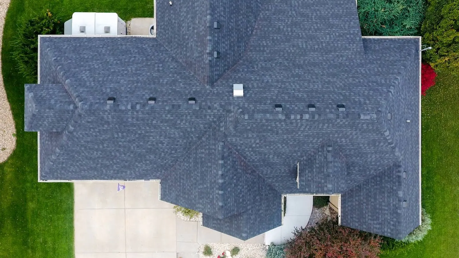 Overhead view of an Oskaloosa, Kansas home with a new charcoal architectural shingle roof