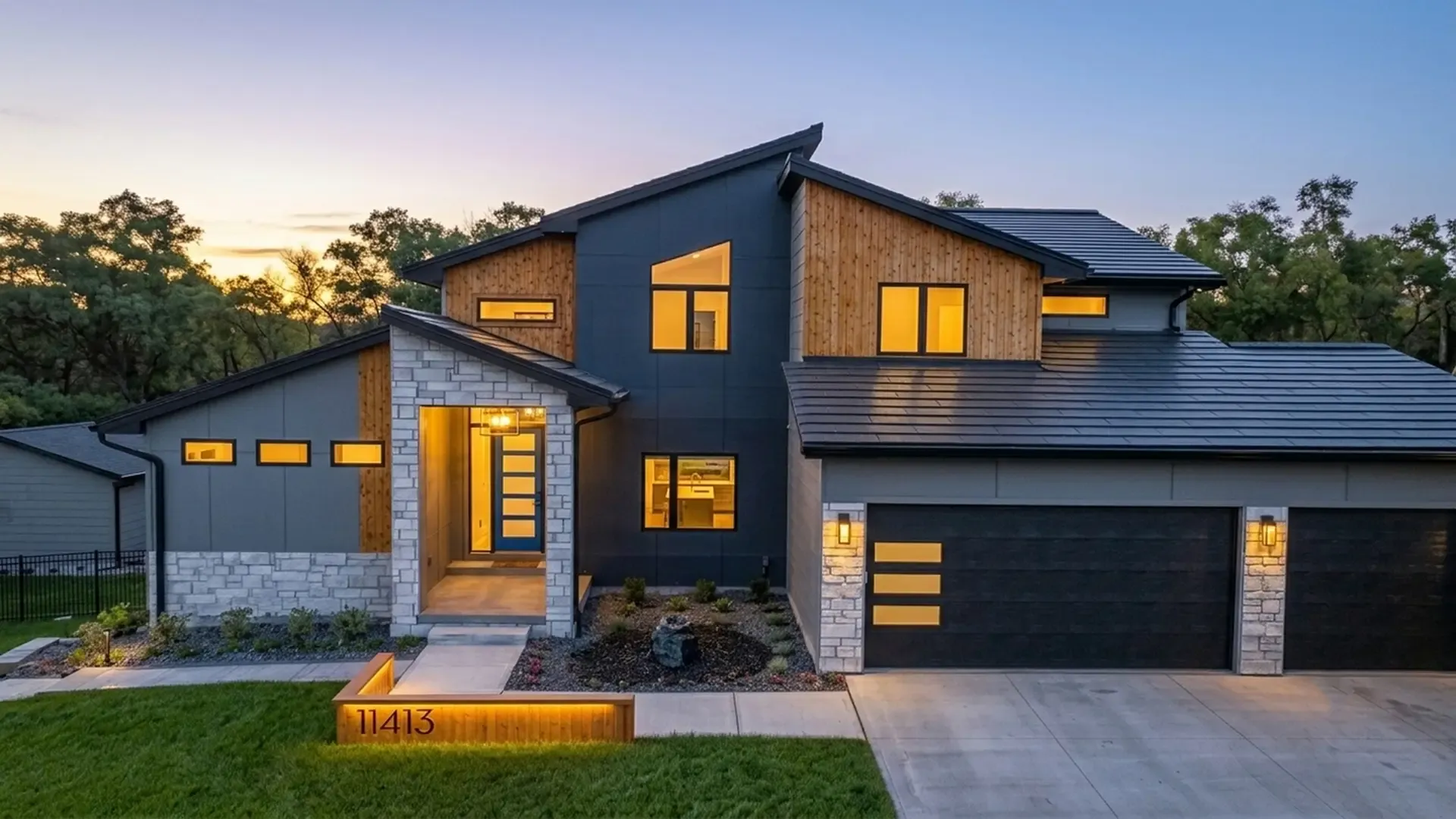 Tesla Solar Roof glass tiles on a luxury modern home