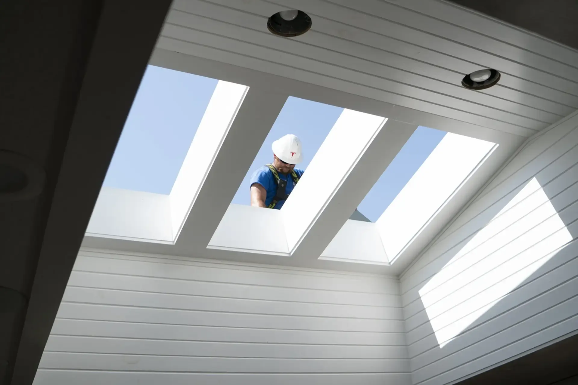 Newly installed skylight framed into a shingle roof in Estes Park, Colorado